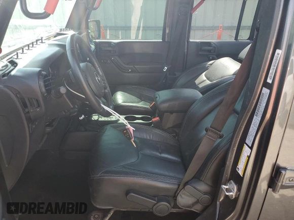 2016 Jeep Wrangler Unlimited Rubicon with VIN 1C4BJWFG8GL192077, listed as a Copart auction lot 58339005 with 62,076 mi miles and Salvage title. Bid and sale history available at DreamBid. Image 7.