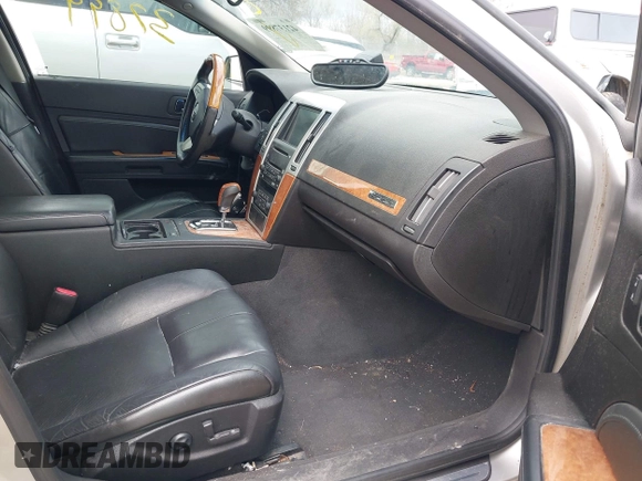 2008 Cadillac STS RWD w/1SB with VIN 1G6DW67V080126989, listed as a IAAI auction lot 42137899 with 123,638 mi miles. Bid and sale history available at carsss.com. Image 5.