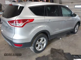 2015 Ford Escape SE with VIN 1FMCU0GX4FUC22042, listed as a IAAI auction lot 42094798 with 35,407 mi miles and . Bid and sale history available at DreamBid. Image 4.