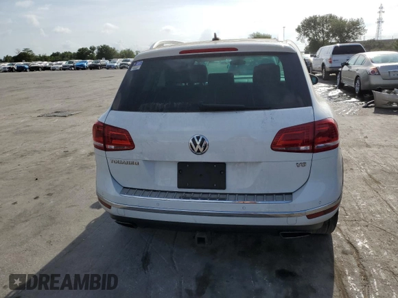 2017 Volkswagen Touareg Sport with VIN WVGEF7BP0HD006792, listed as a Copart auction lot 47895813 with 52,432 mi miles and . Bid and sale history available at DreamBid. Image 6.