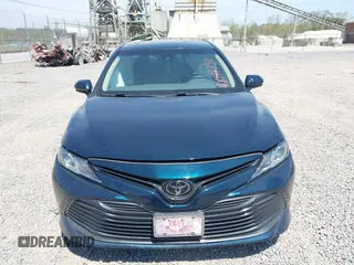 2019 Toyota Camry LE z VIN 4T1B11HK7KU269928, wystawiony jako IAAI lot #42048750 z przebiegiem 102 585 mil mil oraz . Historia ofert i sprzedaży dostępna na DreamBid. Obrazek 12.