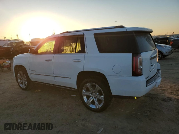2019 GMC Yukon Denali with VIN 1GKS1CKJ6KR122376, listed as a Copart auction lot 85943414 with 90,614 mi miles and Salvage Title. Bid and sale history available at carsss.com. Image 2.