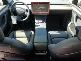 2023 Tesla Model Y Long Range z VIN 7SAYGDEE8PA185193, wystawiony jako Copart lot #48706215 z przebiegiem 10 451 mil mil oraz Szkoda całkowita • Salvage title. Historia ofert i sprzedaży dostępna na DreamBid. Obrazek 8.
