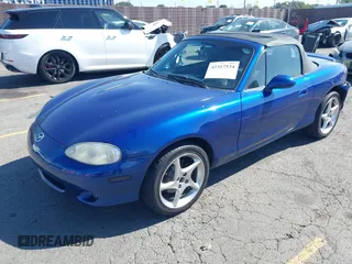 2003 Mazda MX-5 Miata Cloth z VIN JM1NB353830301964, wystawiony jako IAAI lot #42317534 z przebiegiem 192 342 mil mil oraz . Historia ofert i sprzedaży dostępna na DreamBid. Obrazek 2.