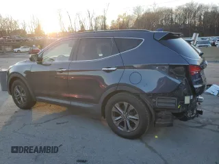 2015 Hyundai Santa Fe z VIN 5XYZU3LB3FG235795, wystawiony jako Copart lot #82047494 z przebiegiem 80 623 mil mil oraz Szkoda całkowita • Salvage title. Historia ofert i sprzedaży dostępna na DreamBid. Obrazek 2.