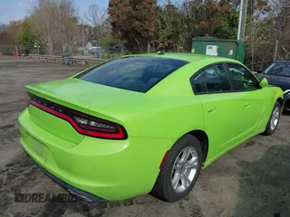 2019 Dodge Charger SXT with VIN 2C3CDXBGXKH713219, listed as a IAAI auction lot 41834667 with 119,798 mi miles. Bid and sale history available at carsss.com. Image 4.