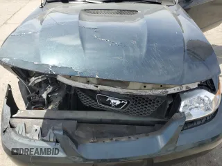 1999 Ford Mustang z VIN 1FAFP4041XF140264, wystawiony jako Copart lot #54801555 z przebiegiem 156 514 mil mil oraz Szkoda całkowita • Salvage title. Historia ofert i sprzedaży dostępna na DreamBid. Obrazek 11.