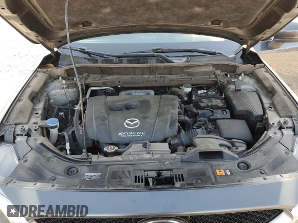 2017 Mazda CX-5 Grand Touring with VIN JM3KFBDL1H0148961, listed as a Copart auction lot 52648115 with 171,767 mi miles and Salvage Title. Bid and sale history available at carsss.com. Image 12.