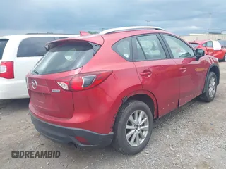 2016 Mazda CX-5 Sport with VIN JM3KE4BY3G0635882, listed as a IAAI auction lot 42545799 with 144,247 mi miles and . Bid and sale history available at DreamBid. Image 4.
