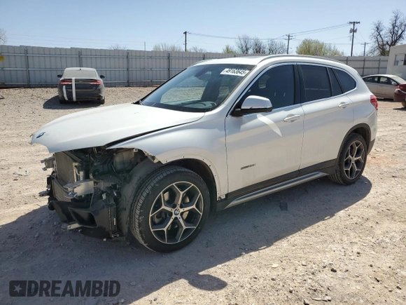 2018 BMW X1 sDrive28i with VIN WBXHU7C34J5H42983, listed as a Copart auction lot 49163645 with 73,508 mi miles and Salvage Title. Bid and sale history available at carsss.com. Image 1.