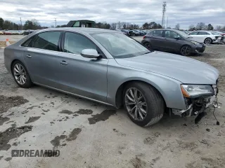 2011 Audi A8 with VIN WAURVAFD9BN006004, listed as a Copart auction lot 47996165 with 132,799 mi miles and Salvage title. Bid and sale history available at DreamBid. Image 4.