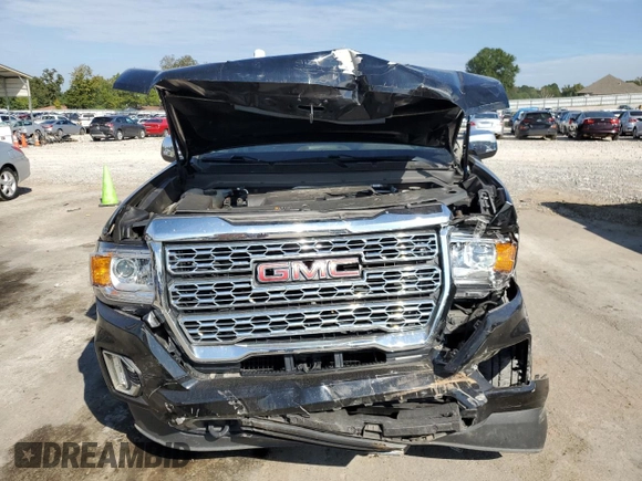 2021 GMC Canyon 2WD Denali with VIN 1GTG5EEN3M1192709, listed as a Copart auction lot 73865224 with 90,575 mi miles and Salvage Title. Bid and sale history available at carsss.com. Image 5.