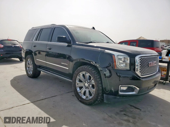 2015 GMC Yukon Denali with VIN 1GKS2CKJ2FR580533, listed as a Copart auction lot 48455205 with 147,532 mi miles and Salvage Title. Bid and sale history available at carsss.com. Image 4.