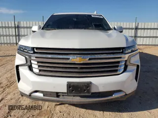 2021 Chevrolet Suburban High Country with VIN 1GNSKGKL5MR135826, listed as a Copart auction lot 82916583 with 58,001 mi miles and . Bid and sale history available at DreamBid. Image 5.