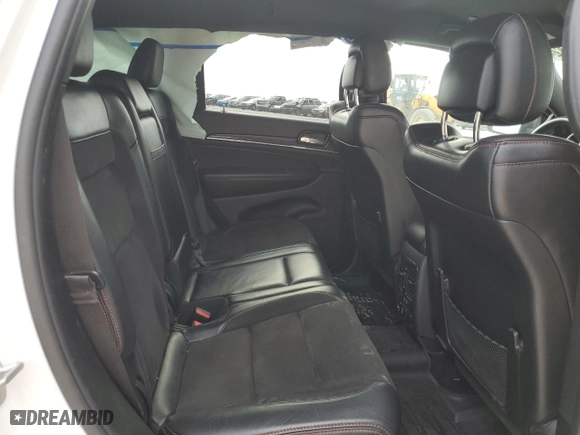 2019 Jeep Grand Cherokee Trailhawk with VIN 1C4RJFLT5KC645905, listed as a Copart auction lot 77326424 with 76,693 mi miles and Salvage Title. Bid and sale history available at carsss.com. Image 11.
