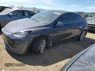 2022 Tesla Model Y Long Range with VIN 7SAYGDEE2NF402320, listed as a Copart auction lot 50396605 with 27,426 mi miles and Salvage Title. Bid and sale history available at DreamBid. Image 1.