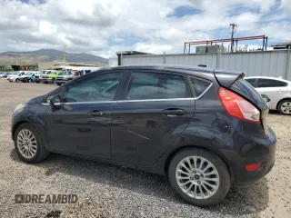2014 Ford Fiesta Titanium z VIN 3FADP4FJXEM228098, wystawiony jako Copart lot #55173975 z przebiegiem 109 311 mil mil oraz Szkoda całkowita • Salvage title. Historia ofert i sprzedaży dostępna na DreamBid. Obrazek 2.