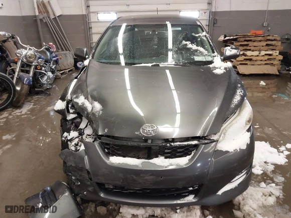 2013 Toyota Matrix L with VIN 2T1KU4EE0DC029826, listed as a IAAI auction lot 41598107 with 249,427 mi miles. Bid and sale history available at carsss.com. Image 12.