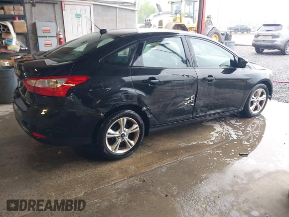 2013 Ford Focus SE with VIN 1FADP3F21DL333194, listed as a IAAI auction lot 42071641 with 107,912 mi miles. Bid and sale history available at carsss.com. Image 4.