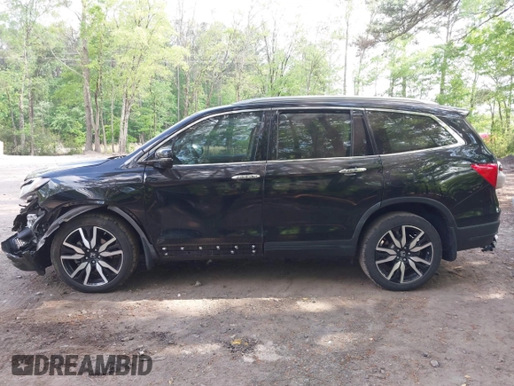 2019 Honda Pilot Touring 7-Passenger with VIN 5FNYF6H60KB030990, listed as a IAAI auction lot 42160762 with 68,807 mi miles and . Bid and sale history available at DreamBid. Image 14.