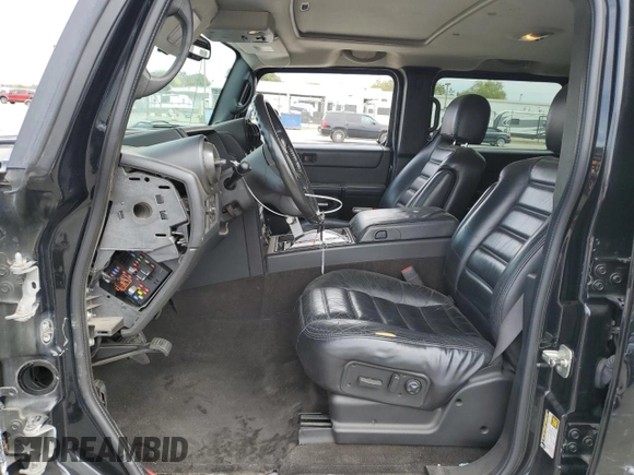 2005 Hummer H2 SUV with VIN 5GRGN23UX5H115383, listed as a Copart auction lot 71682984 with 157,405 mi miles and Salvage Title. Bid and sale history available at carsss.com. Image 7.