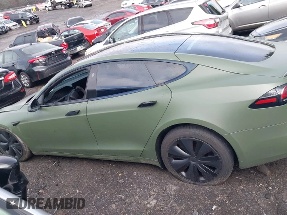 2022 Tesla Model S with VIN 5YJSA1E50NF487306, listed as a IAAI auction lot 41570528 with Not Provided miles and . Bid and sale history available at DreamBid. Image 15.