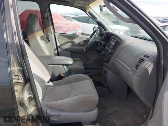 2001 Mazda Tribute LX with VIN 4F2CU08191KM27990, listed as a IAAI auction lot 41487001 with 209,394 mi miles and . Bid and sale history available at carsss.com. Image 5.