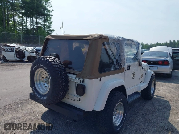 2002 Jeep Wrangler Sahara with VIN 1J4FA59S92P734763, listed as a IAAI auction lot 42411004 with 188,213 mi miles and . Bid and sale history available at DreamBid. Image 4.