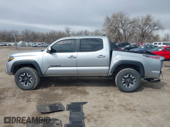 2023 Toyota Tacoma 4WD SR with VIN 3TMCZ5AN0PM609672, listed as a IAAI auction lot 41830191 with 24,244 mi miles. Bid and sale history available at carsss.com. Image 14.