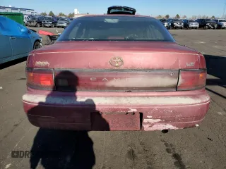 1993 Toyota Camry LE with VIN JT2SK12E8P0149731, listed as a Copart auction lot 83082154 with 197,590 mi miles and Salvage Title. Bid and sale history available at carsss.com. Image 6.