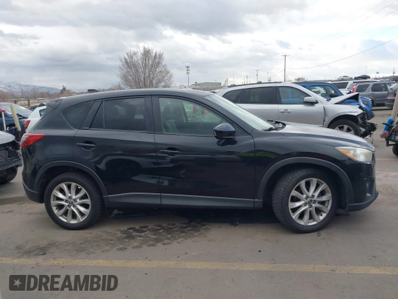 2013 Mazda CX-5 Grand Touring with VIN JM3KE4DEXD0154638, listed as a IAAI auction lot 41528944 with 195,159 mi miles. Bid and sale history available at carsss.com. Image 13.