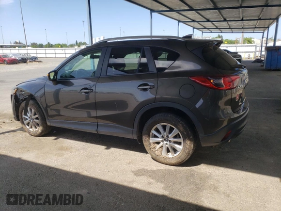 2016 Mazda CX-5 Touring z VIN JM3KE2CY4G0805072, wystawiony jako Copart lot #58435535 z przebiegiem 146 323 mil mil oraz Szkoda całkowita • Salvage title. Historia ofert i sprzedaży dostępna na DreamBid. Obrazek 2.