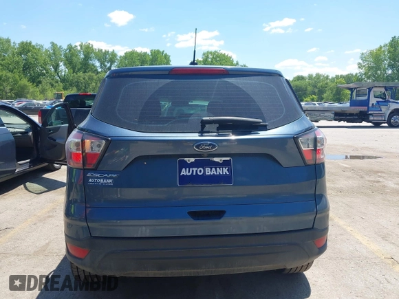 2018 Ford Escape S z VIN 1FMCU0F79JUA63979, wystawiony jako IAAI lot #42184819 z przebiegiem 125 720 mil mil oraz . Historia ofert i sprzedaży dostępna na DreamBid. Obrazek 16.