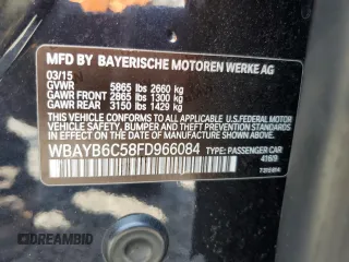 2015 BMW 7 Series 750i xDrive with VIN WBAYB6C58FD966084, listed as a Copart auction lot 61875325 with 159,616 mi miles and Salvage title. Bid and sale history available at DreamBid. Image 13.