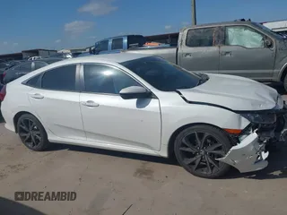 2019 Honda Civic Sport with VIN 19XFC2F81KE024702, listed as a IAAI auction lot 42018077 with 98,613 mi miles and . Bid and sale history available at DreamBid. Image 13.