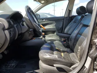 2000 Volkswagen Passat GLS z VIN WVWMD23B0YP307525, wystawiony jako Copart lot #57040775 z przebiegiem 167 440 mil mil oraz Szkoda całkowita • Salvage title. Historia ofert i sprzedaży dostępna na DreamBid. Obrazek 7.