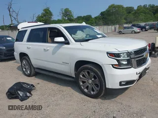 2017 Chevrolet Tahoe LT with VIN 1GNSKBKC2HR330422, listed as a IAAI auction lot 42419205 with 136,444 mi miles and . Bid and sale history available at DreamBid. Image 1.