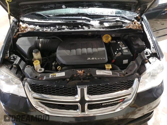 2016 Dodge Grand Caravan SE with VIN 2C4RDGBGXGR178352, listed as a Copart auction lot 88308065 with 121,415 mi miles and Clean Title. Bid and sale history available at DreamBid. Image 12.
