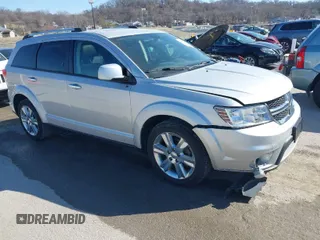 2014 Dodge Journey Limited with VIN 3C4PDCDG7ET219835, listed as a IAAI auction lot 41755551 with 151,332 mi miles and . Bid and sale history available at DreamBid. Image 1.