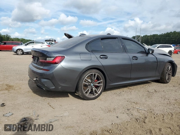 2022 BMW 3 Series M340i xDrive with VIN WBA5U9C02NFL65825, listed as a Copart auction lot 60244064 with 22,548 mi miles and Salvage Title. Bid and sale history available at DreamBid. Image 3.