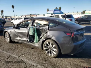 2025 Tesla Model 3 Long Range with VIN 5YJ3E1EA4SF887547, listed as a Copart auction lot 85526184 with 2,506 mi miles and Salvage title. Bid and sale history available at DreamBid. Image 2.