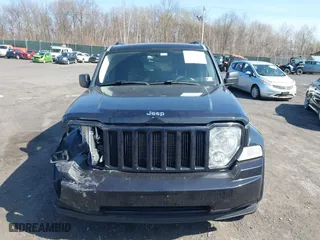2011 Jeep Liberty Sport 70th Anniversary with VIN 1J4PN2GKXBW539030, listed as a IAAI auction lot 41913633 with 115,605 mi miles. Bid and sale history available at carsss.com. Image 12.