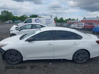 2023 Kia Forte GT-Line z VIN 3KPF54ADXPE621767, wystawiony jako IAAI lot #41991079 z przebiegiem 27 124 mil mil oraz . Historia ofert i sprzedaży dostępna na DreamBid. Obrazek 15.
