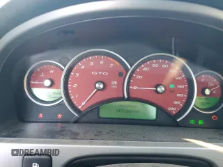2005 Pontiac GTO with VIN 6G2VX12U75L457697, listed as a Copart auction lot 84683564 with 57,504 mi miles and Salvage Title. Bid and sale history available at carsss.com. Image 9.