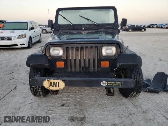 1992 Jeep Wrangler with VIN 2J4FY29SXNJ554171, listed as a Copart auction lot 77655294 with 115,494 mi miles and Salvage Title. Bid and sale history available at carsss.com. Image 5.