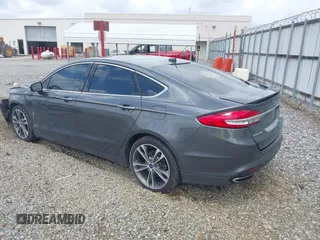 2017 Ford Fusion Titanium with VIN 3FA6P0K98HR363360, listed as a IAAI auction lot 42461432 with 182,807 mi miles and . Bid and sale history available at DreamBid. Image 3.