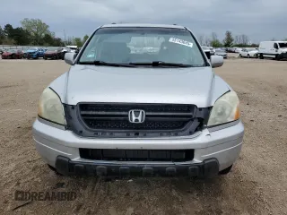 2003 Honda Pilot EX z VIN 2HKYF18583H515617, wystawiony jako Copart lot #55143045 z przebiegiem 175 976 mil mil oraz Szkoda całkowita • Salvage title. Historia ofert i sprzedaży dostępna na DreamBid. Obrazek 5.