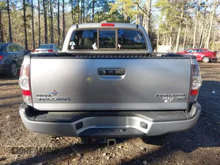 2015 Toyota Tacoma PreRunner z VIN 3TMJU4GNXFM191580, wystawiony jako IAAI lot #41216357 z przebiegiem 78 490 mil mil oraz . Historia ofert i sprzedaży dostępna na DreamBid. Obrazek 16.