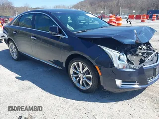 2013 Cadillac XTS Luxury z VIN 2G61P5S3XD9178551, wystawiony jako IAAI lot #41889784 z przebiegiem 111 580 mil mil oraz . Historia ofert i sprzedaży dostępna na DreamBid. Obrazek 1.