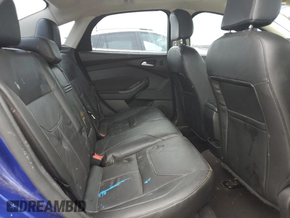 2015 Ford Focus Titanium z VIN 1FADP3J20FL299209, wystawiony jako Copart lot #67681504 z przebiegiem 98 711 mil mil oraz Nie do naprawy • Non repairable. Historia ofert i sprzedaży dostępna na DreamBid. Obrazek 10.